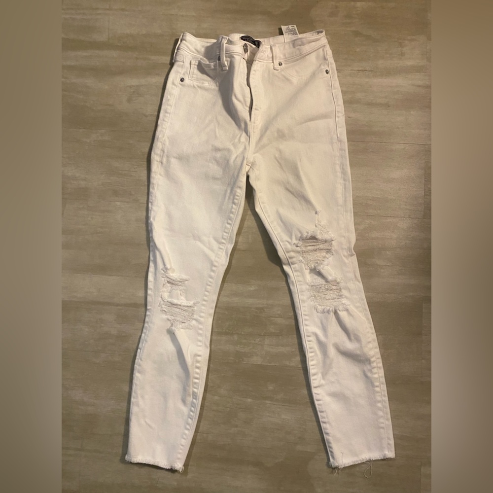 Abercrombie and Fitch ultra high rise , super skinny, ripped white jeans.